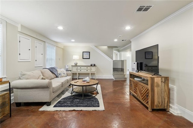 living room featuring crown molding