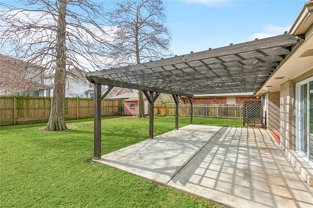 view of patio with a storage unit and a pergola