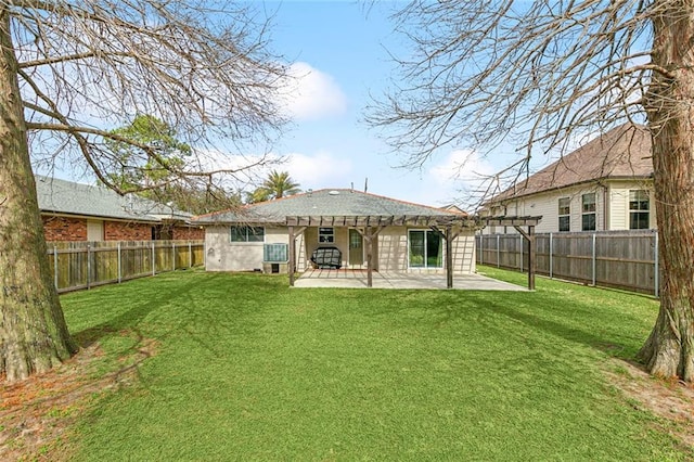 rear view of property with a pergola, a patio area, and a lawn