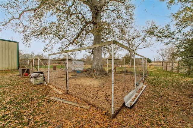 view of play area with an outbuilding