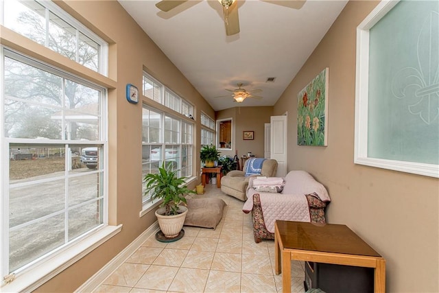 sunroom / solarium with ceiling fan