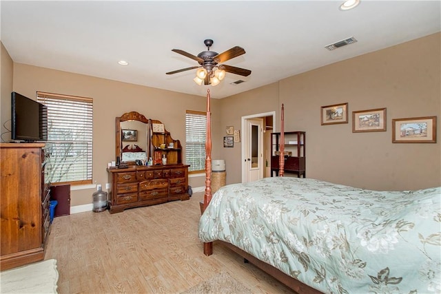 bedroom featuring light hardwood / wood-style flooring and ceiling fan