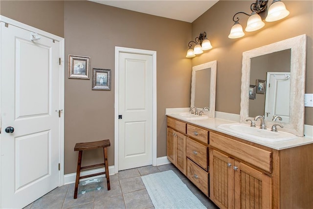 bathroom featuring tile patterned flooring and vanity