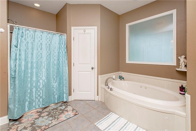 bathroom featuring plus walk in shower and tile patterned floors