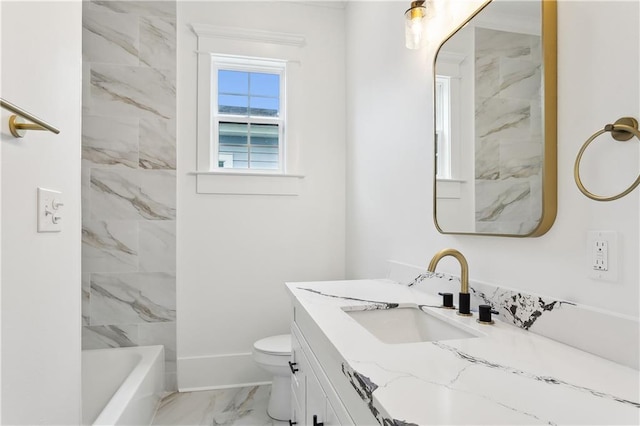 full bathroom featuring tiled shower / bath, vanity, and toilet