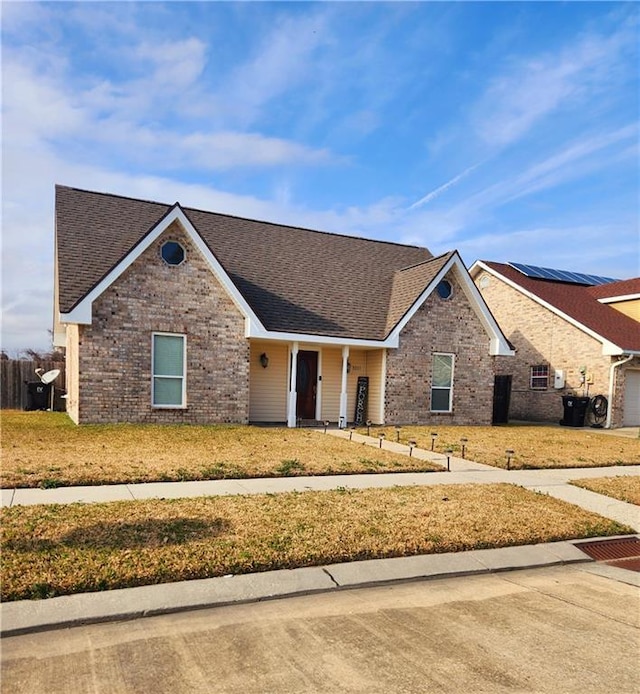 view of front facade with a garage and a front yard