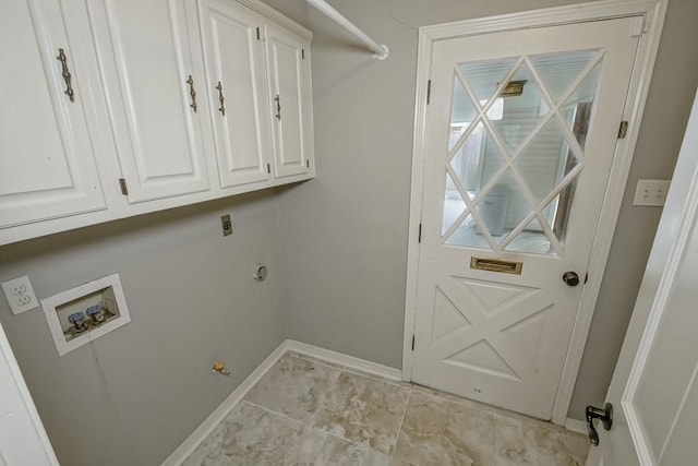 laundry room with cabinets, hookup for an electric dryer, hookup for a gas dryer, and hookup for a washing machine