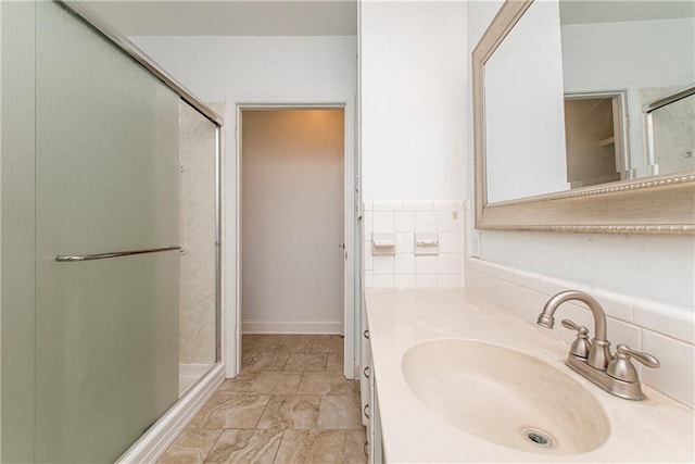 bathroom with vanity and walk in shower