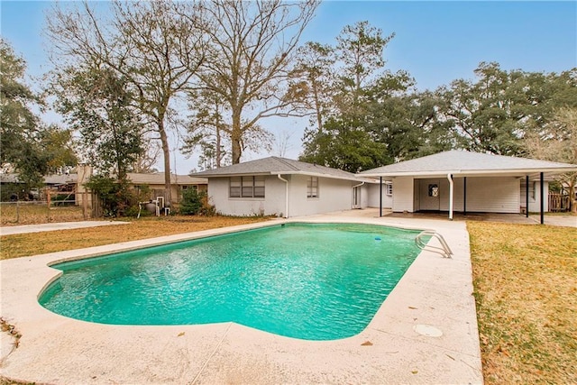 view of pool featuring a yard