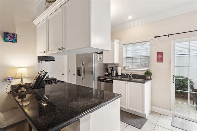 kitchen with crown molding, stainless steel appliances, sink, and white cabinets