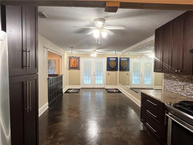 kitchen with dark brown cabinets, light stone countertops, french doors, and ceiling fan