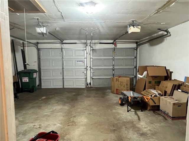 garage featuring a garage door opener