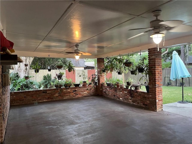 view of patio featuring ceiling fan