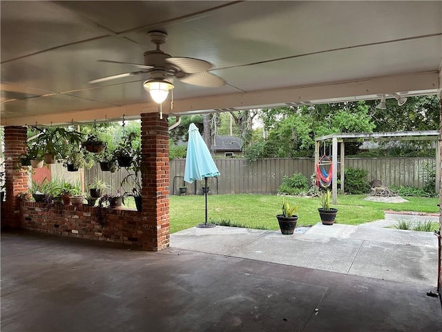 view of patio / terrace featuring ceiling fan