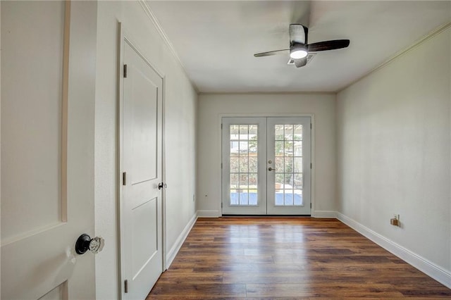 entryway with french doors, ceiling fan, dark hardwood / wood-style flooring, and crown molding