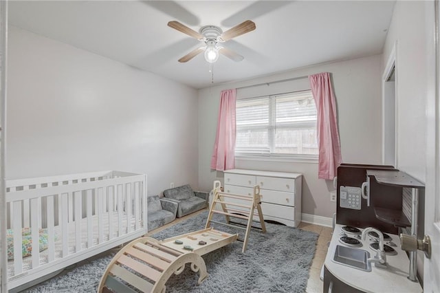 bedroom featuring ceiling fan