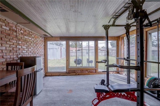 sunroom with wooden ceiling