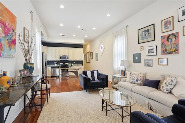 living room featuring dark hardwood / wood-style floors