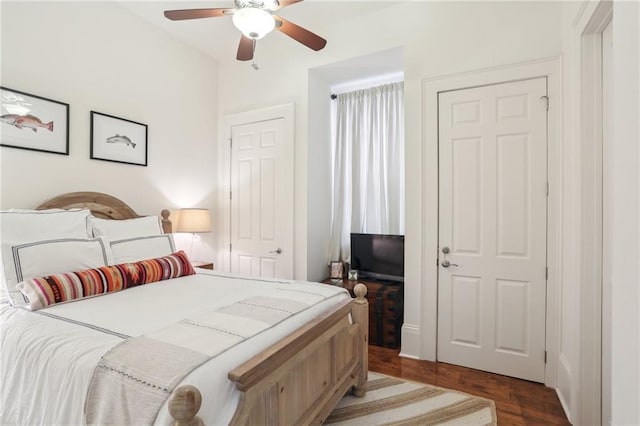 bedroom with hardwood / wood-style flooring and ceiling fan