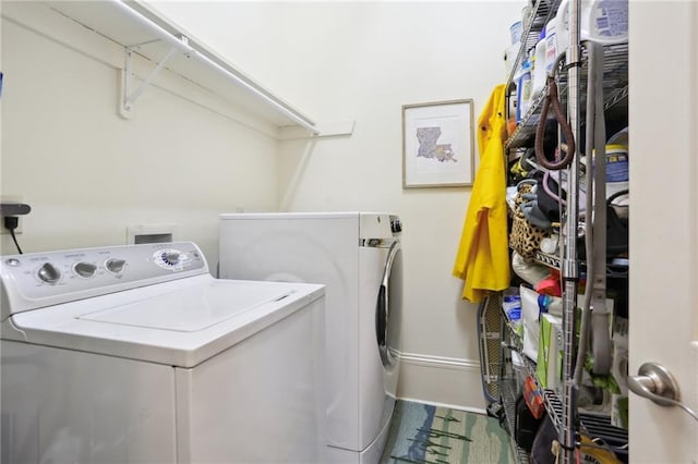 laundry room with washer and dryer