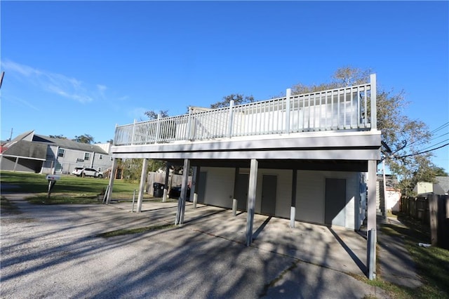 exterior space with a carport