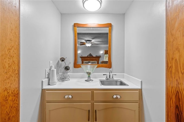 bathroom featuring ceiling fan and vanity