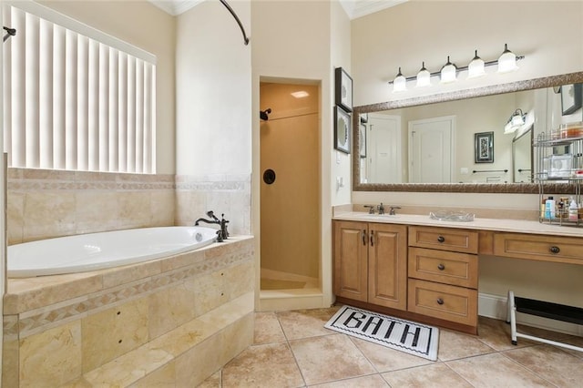 bathroom with tile patterned flooring, vanity, ornamental molding, and shower with separate bathtub