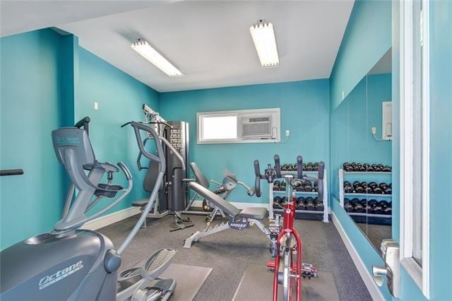 gym with an AC wall unit