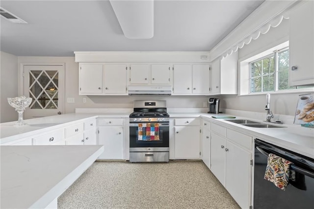 kitchen featuring dishwasher, sink, stainless steel range with gas stovetop, and white cabinets