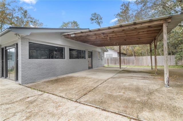 view of car parking with a carport