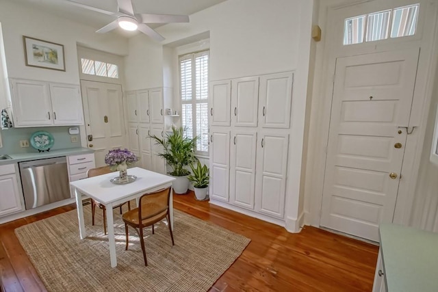 dining area featuring ceiling fan and light wood-type flooring