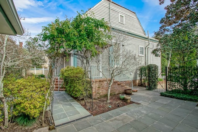 view of home's exterior featuring a patio