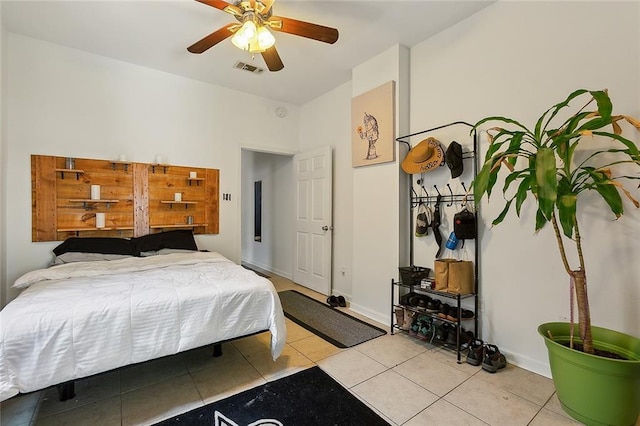 bedroom with light tile patterned floors and ceiling fan