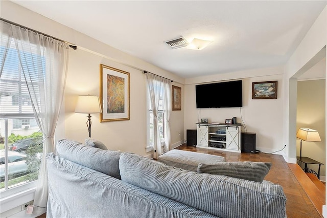 living room featuring a wealth of natural light