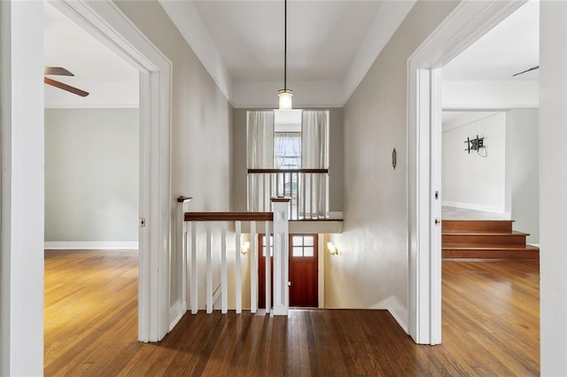 hall with wood-type flooring