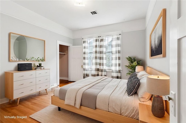 bedroom featuring light hardwood / wood-style floors