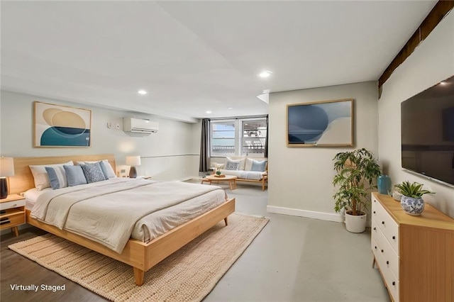 bedroom with concrete floors and a wall mounted AC