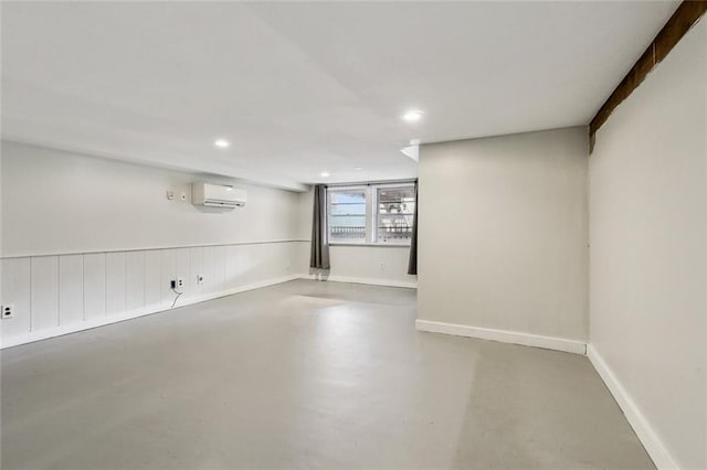 basement with a wall mounted air conditioner