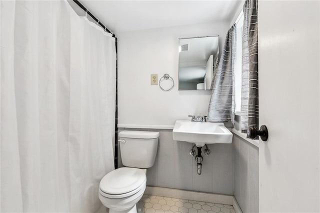 bathroom with toilet and sink