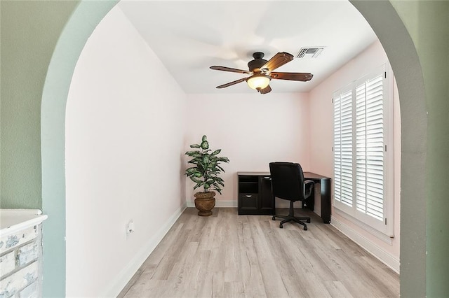 office area with ceiling fan and light hardwood / wood-style floors