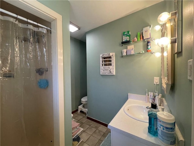 bathroom with tile patterned flooring, vanity, a shower with shower curtain, and toilet