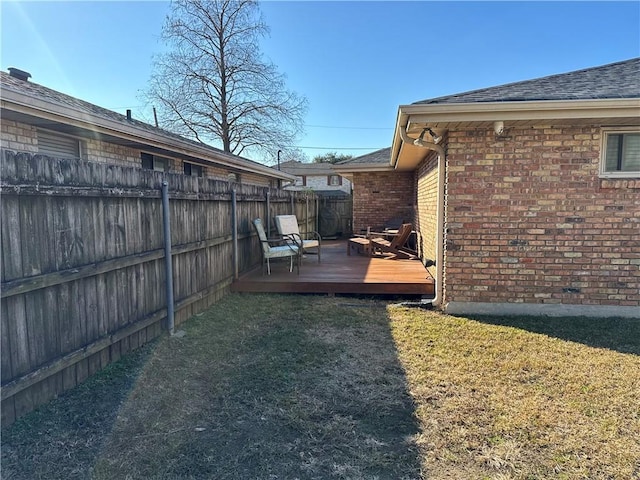 view of yard with a deck