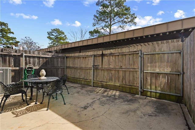 view of patio with central AC