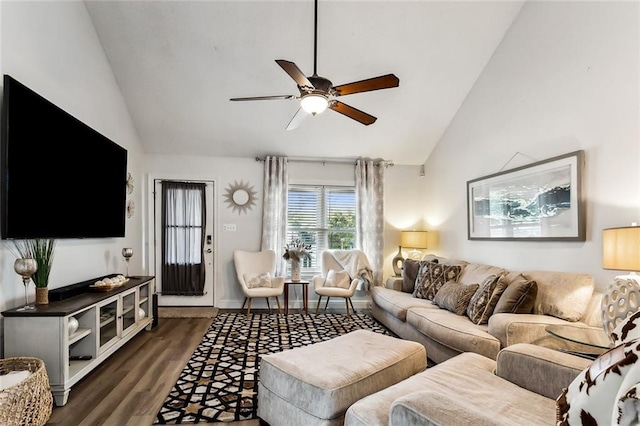 living room featuring dark wood-type flooring, ceiling fan, and vaulted ceiling