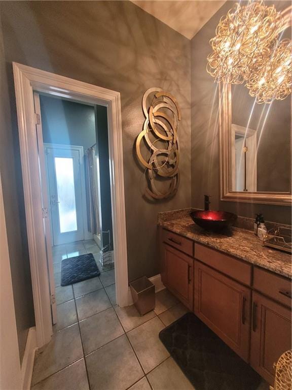 bathroom with vanity and tile patterned flooring