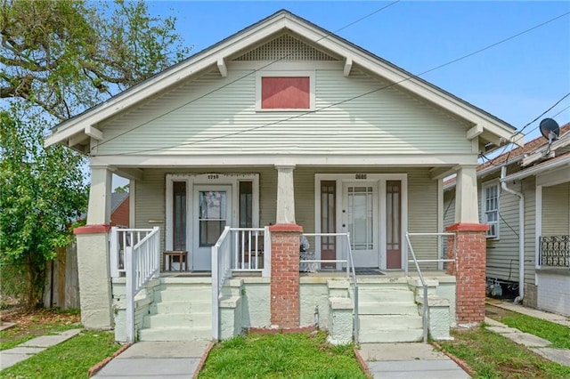 bungalow-style house featuring covered porch