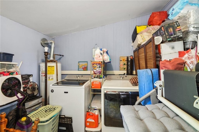 171315 8th St, New Orleans, LA 70115 - laundry room with laundry area, water heater, and washer and clothes dryer