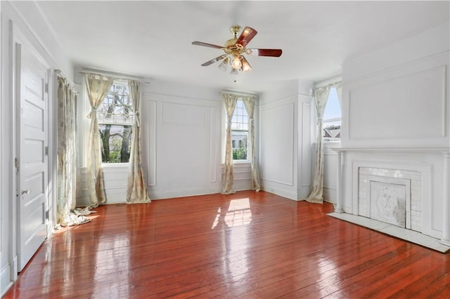 unfurnished room featuring hardwood / wood-style floors and ceiling fan