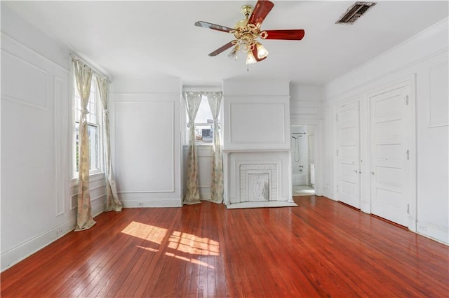 unfurnished bedroom with hardwood / wood-style floors and ceiling fan