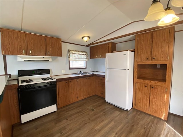 68443 S River Rd, Kentwood, LA 70444 - kitchen with lofted ceiling, sink, gas range, white refrigerator, and dark hardwood / wood-style floors